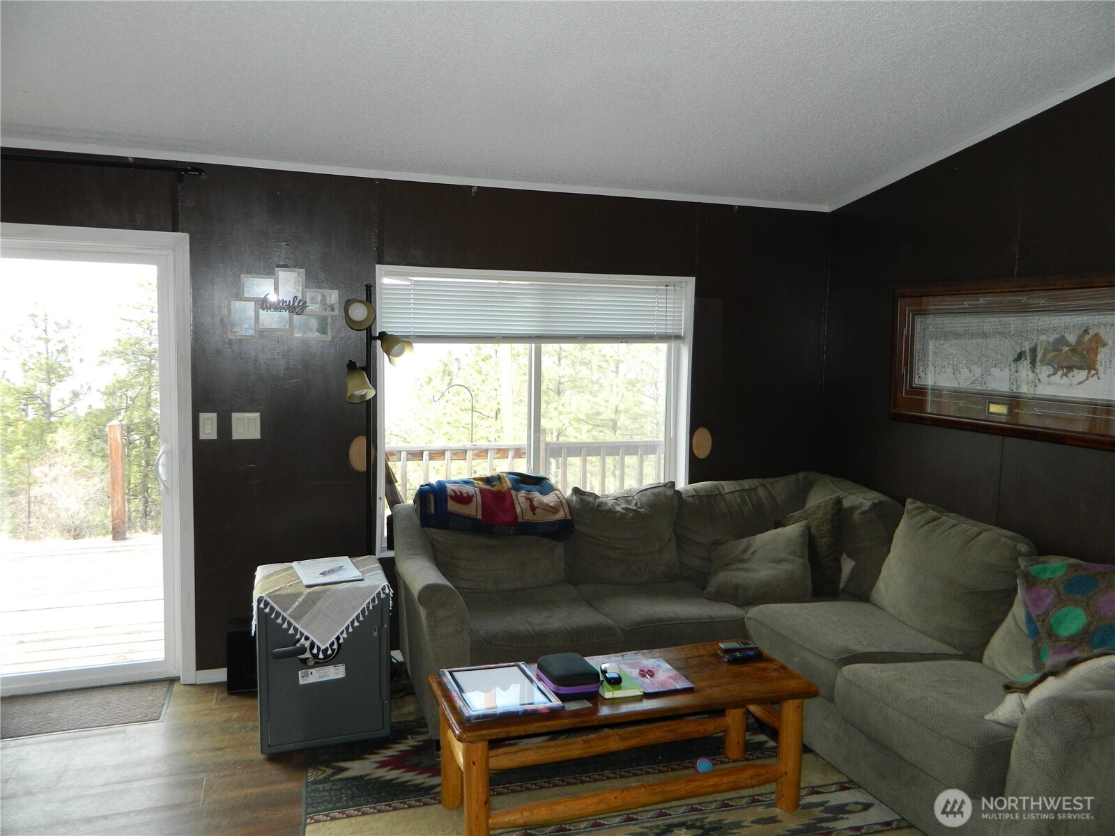 28 Ridgeline Road Tonasket, WA 98855 - Photo 13 of 19 a living room with furniture and a window