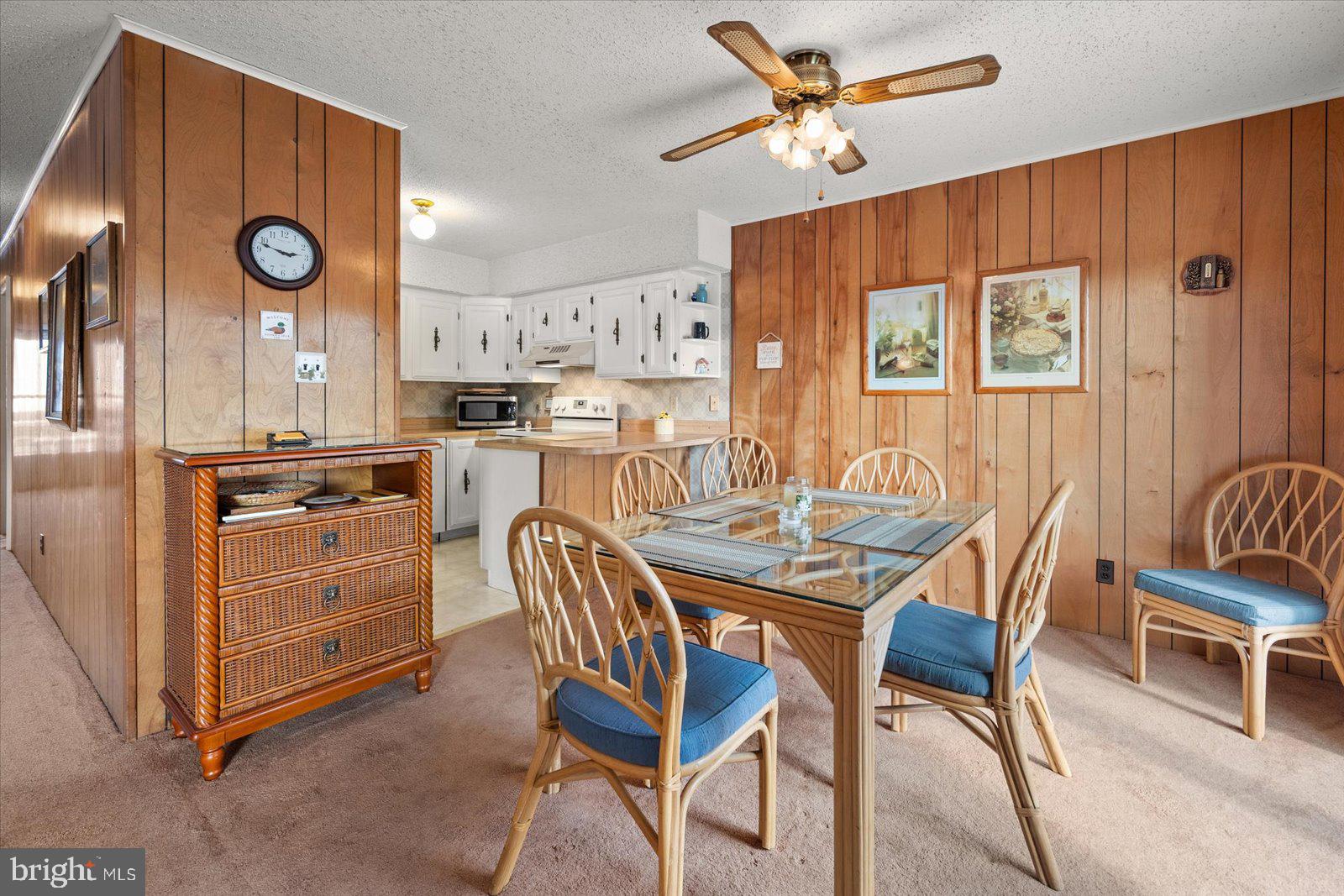 12 128th Street, Unit 2 Ocean City, MD 21842 - Photo 18 of 40 a dining room with furniture and window