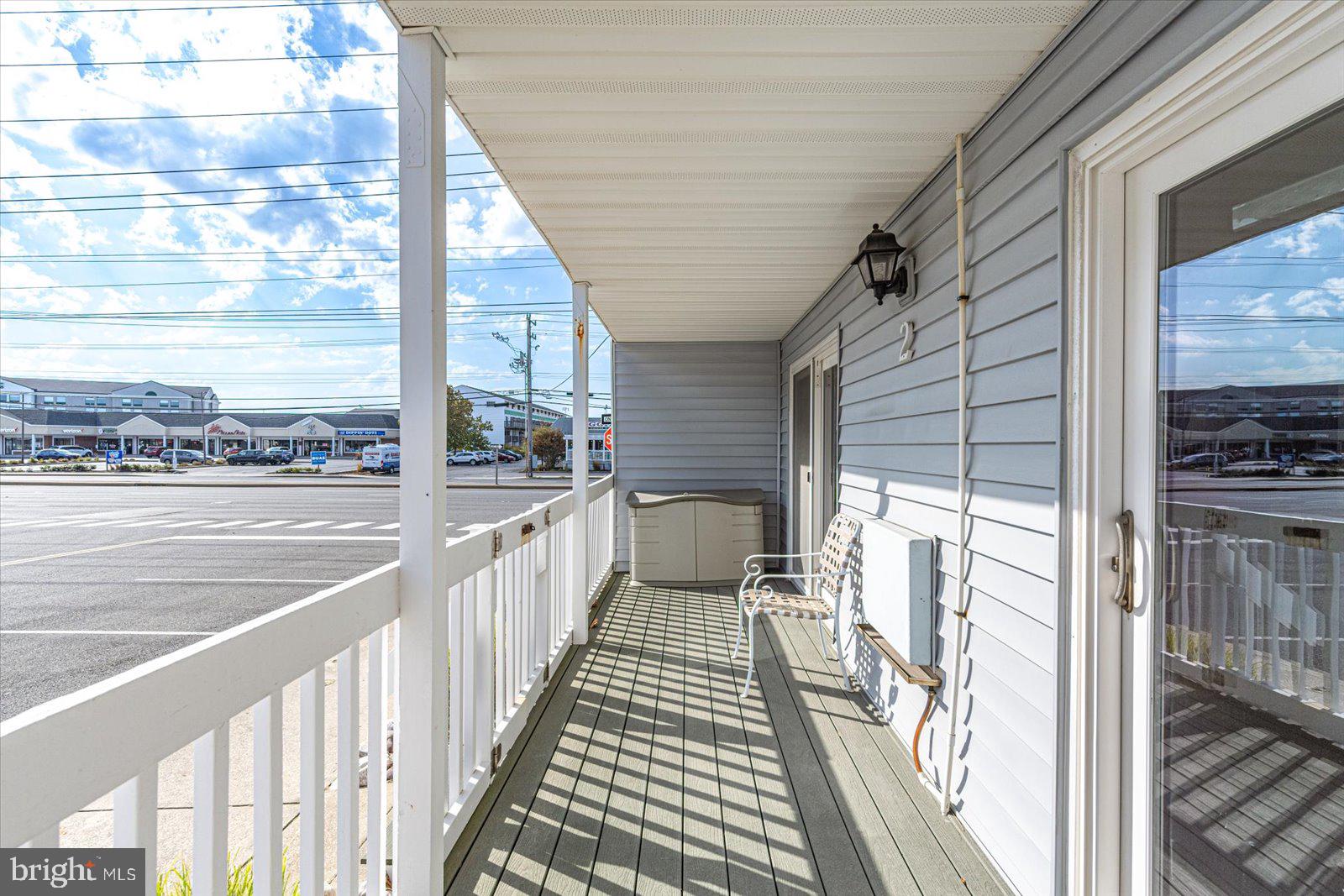 12 128th Street, Unit 2 Ocean City, MD 21842 - Photo 32 of 40 a view of a balcony with wooden floor