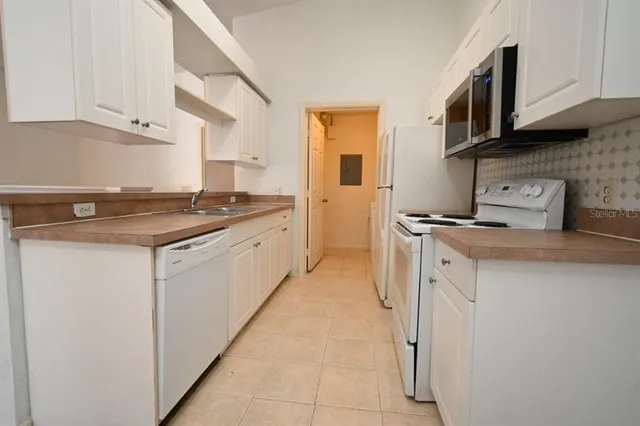 a bathroom with a toilet and bathtub