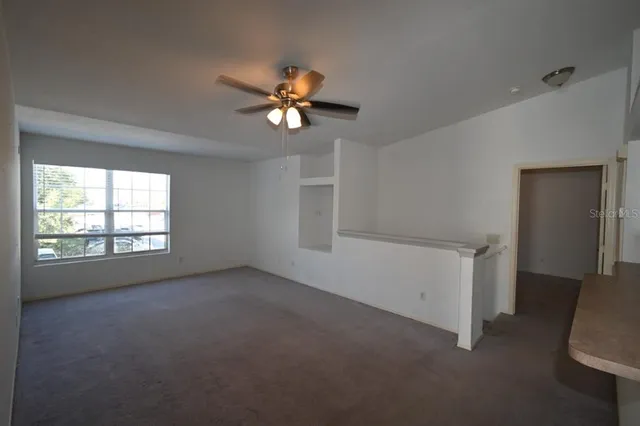 a view of a kitchen with electric appliances
