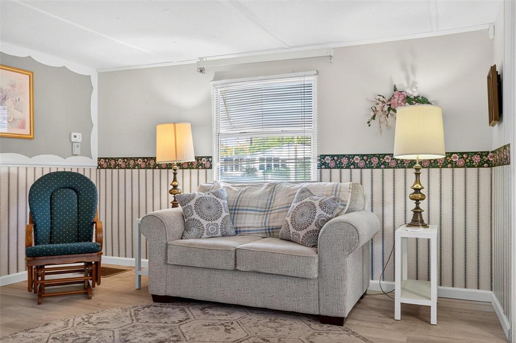 684 Cindi Avenue Leesburg, FL 34788 - Photo 20 of 60 a living room with furniture and a window
