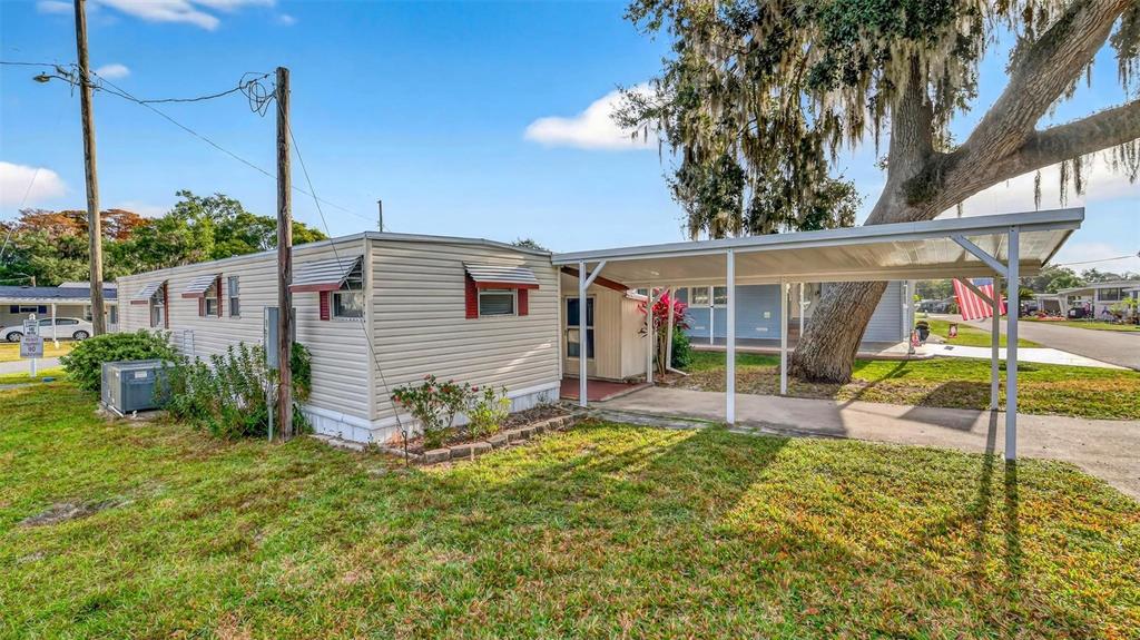 684 Cindi Avenue Leesburg, FL 34788 - Photo 35 of 60 a house view with a backyard space