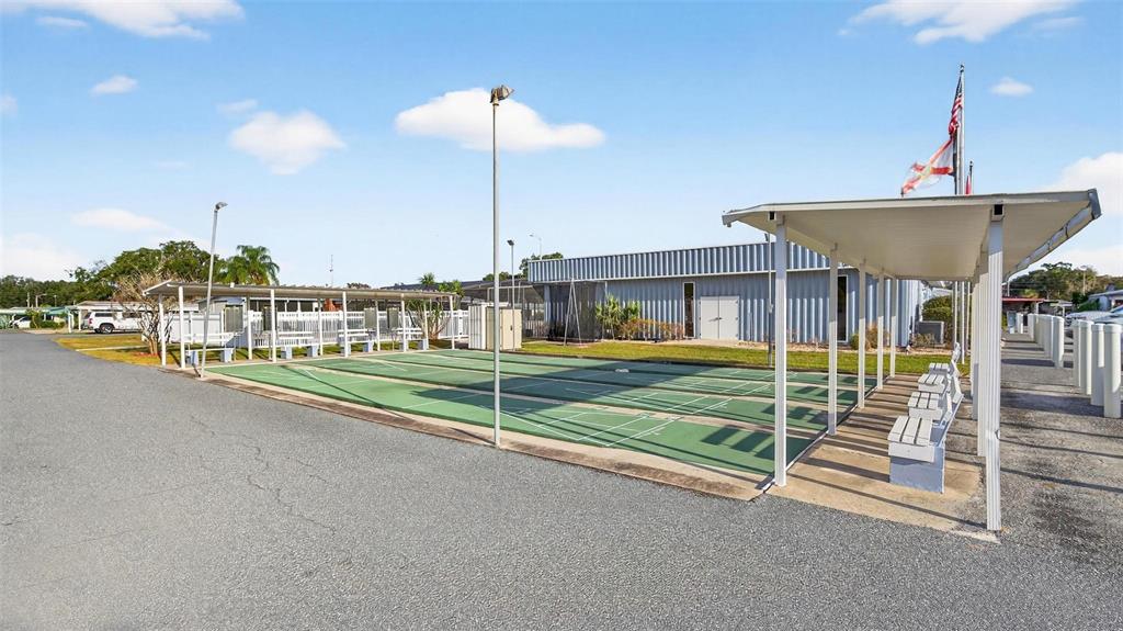 684 Cindi Avenue Leesburg, FL 34788 - Photo 38 of 60 a view of a house with a porch and furniture