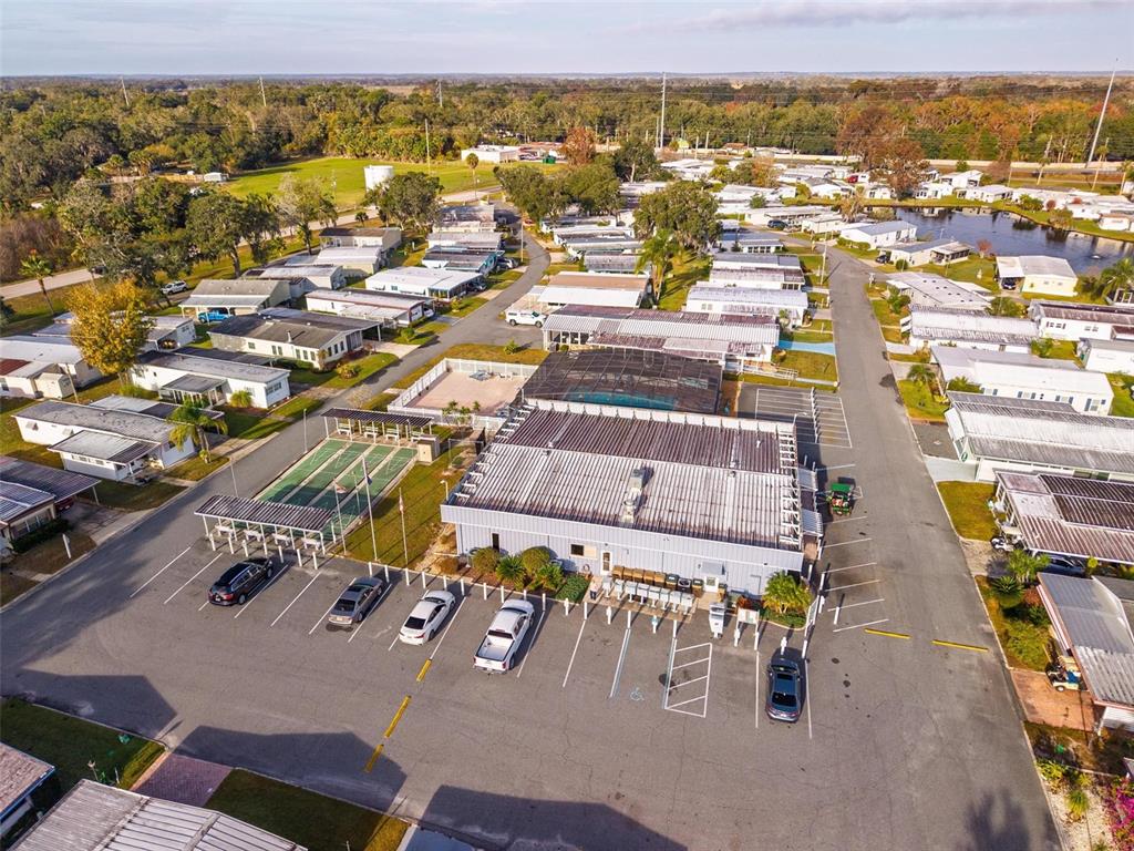 684 Cindi Avenue Leesburg, FL 34788 - Photo 41 of 60 an aerial view of residential houses with outdoor space