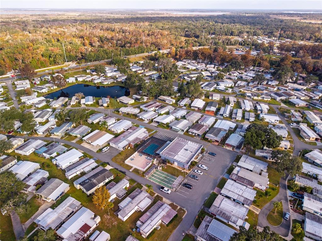 684 Cindi Avenue Leesburg, FL 34788 - Photo 44 of 60 an aerial view of residential houses with city view