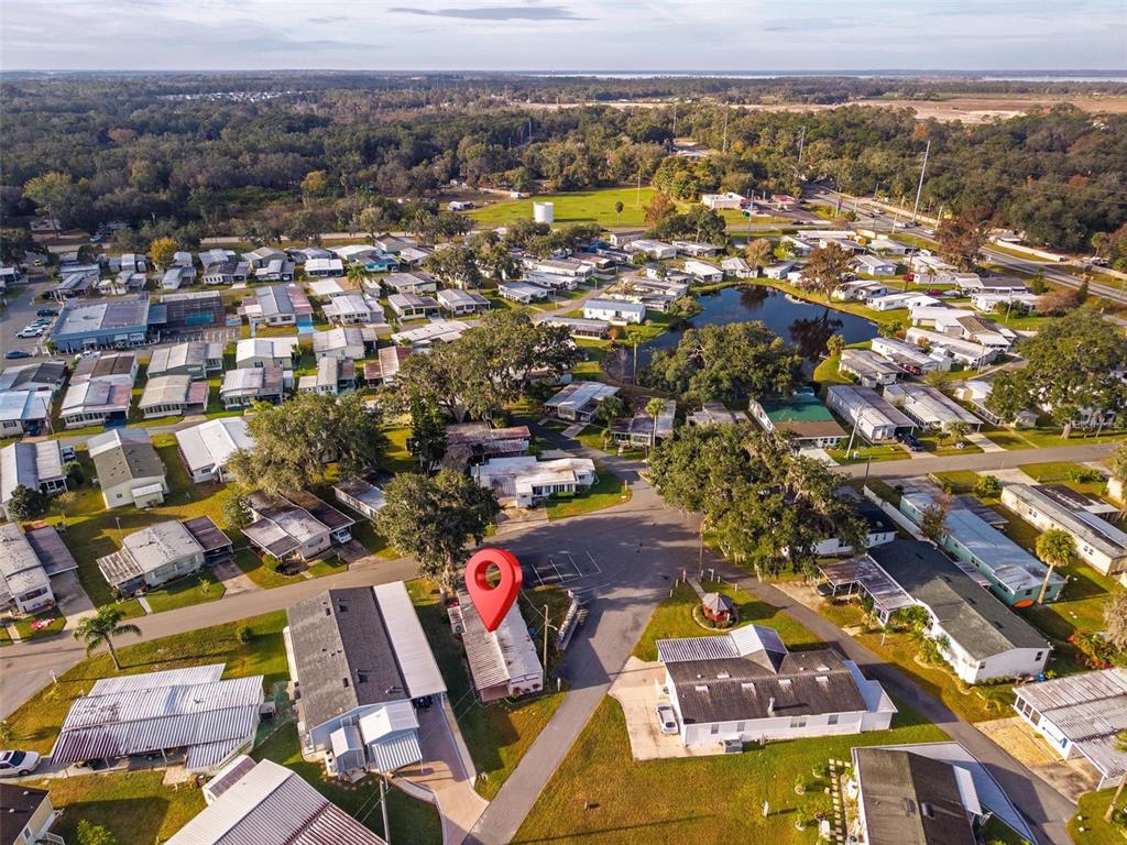 684 Cindi Avenue Leesburg, FL 34788 - Photo 48 of 60 an aerial view of residential houses with city view