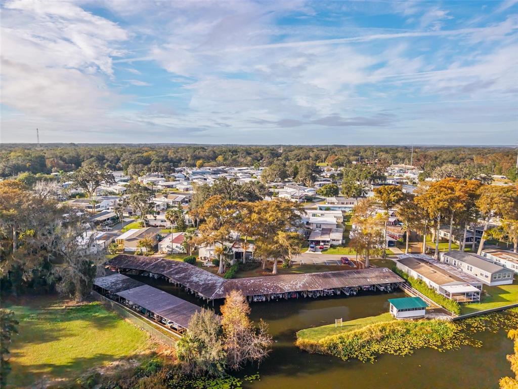 684 Cindi Avenue Leesburg, FL 34788 - Photo 59 of 60 an aerial view of residential houses with outdoor space