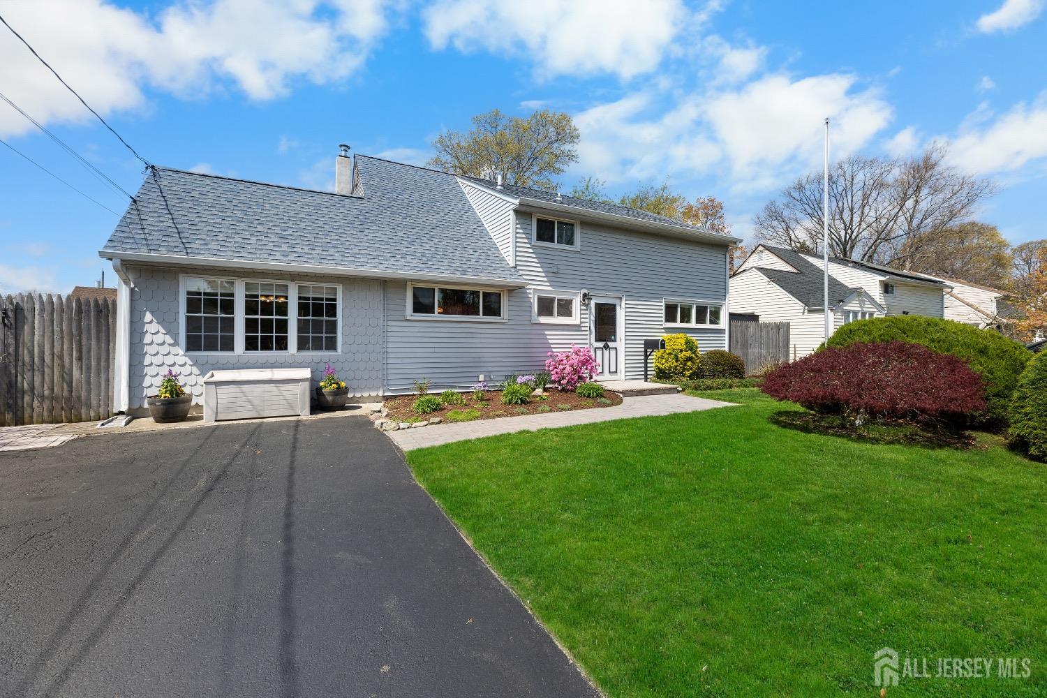 9 Pine Tree Road Old Bridge, NJ 08857 - Photo 12 of 46 a front view of house with yard and green space