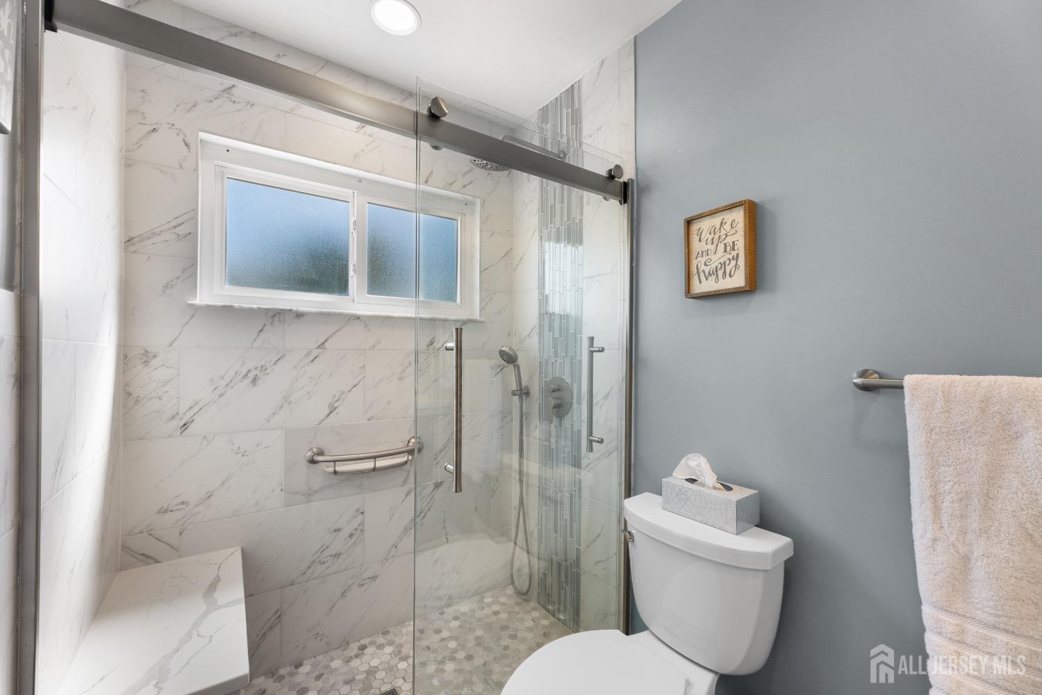 9 Pine Tree Road Old Bridge, NJ 08857 - Photo 15 of 46 a bathroom with a toilet sink and shower