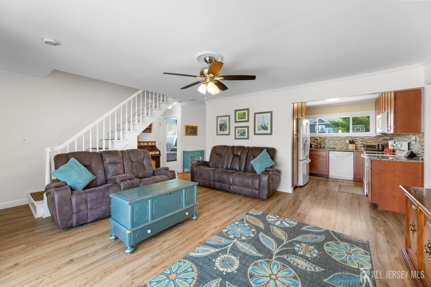 9 Pine Tree Road Old Bridge, NJ 08857 - Photo 18 of 46 a living room with furniture and a fireplace