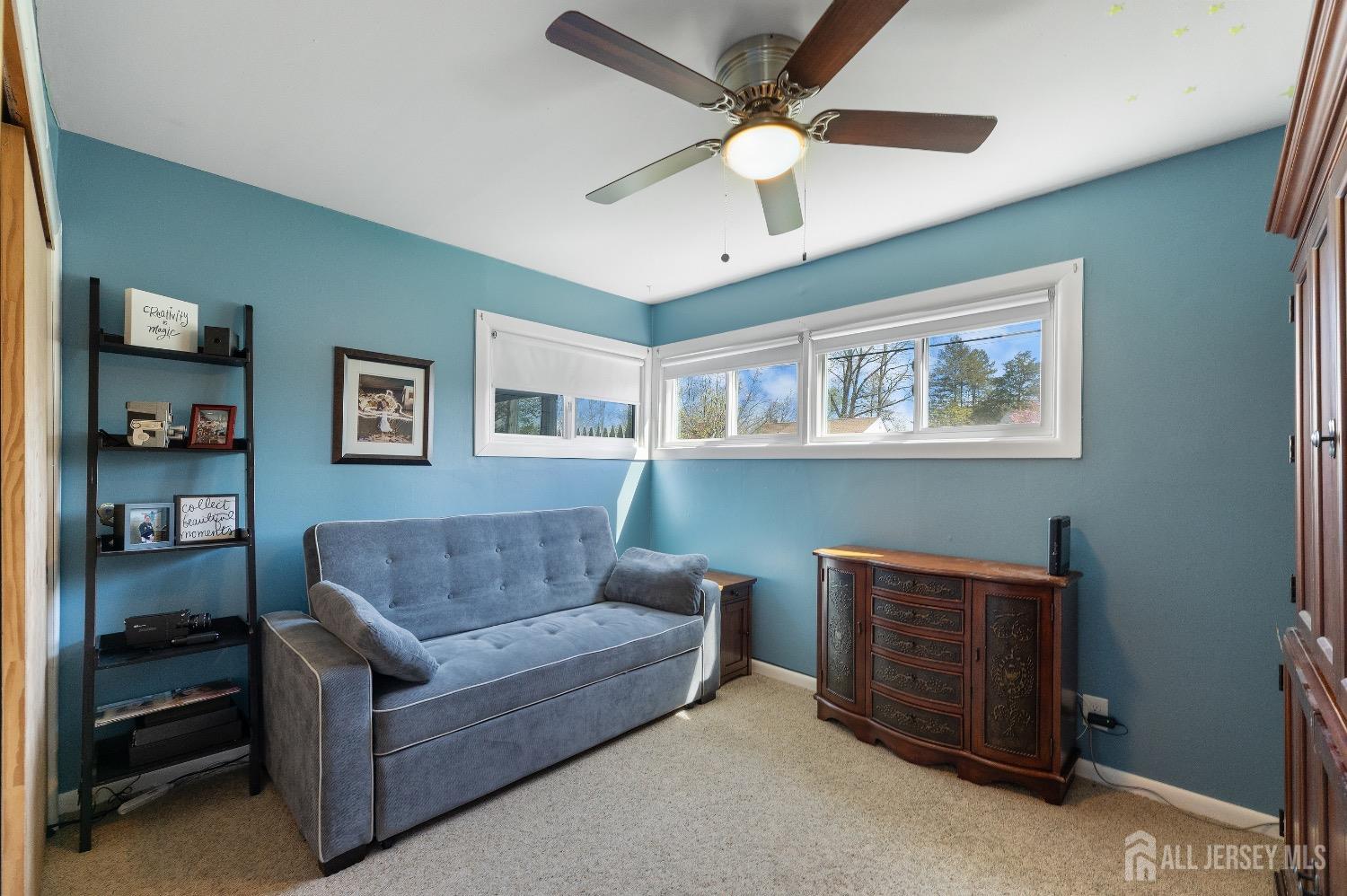 9 Pine Tree Road Old Bridge, NJ 08857 - Photo 27 of 46 a living room with furniture and a ceiling fan