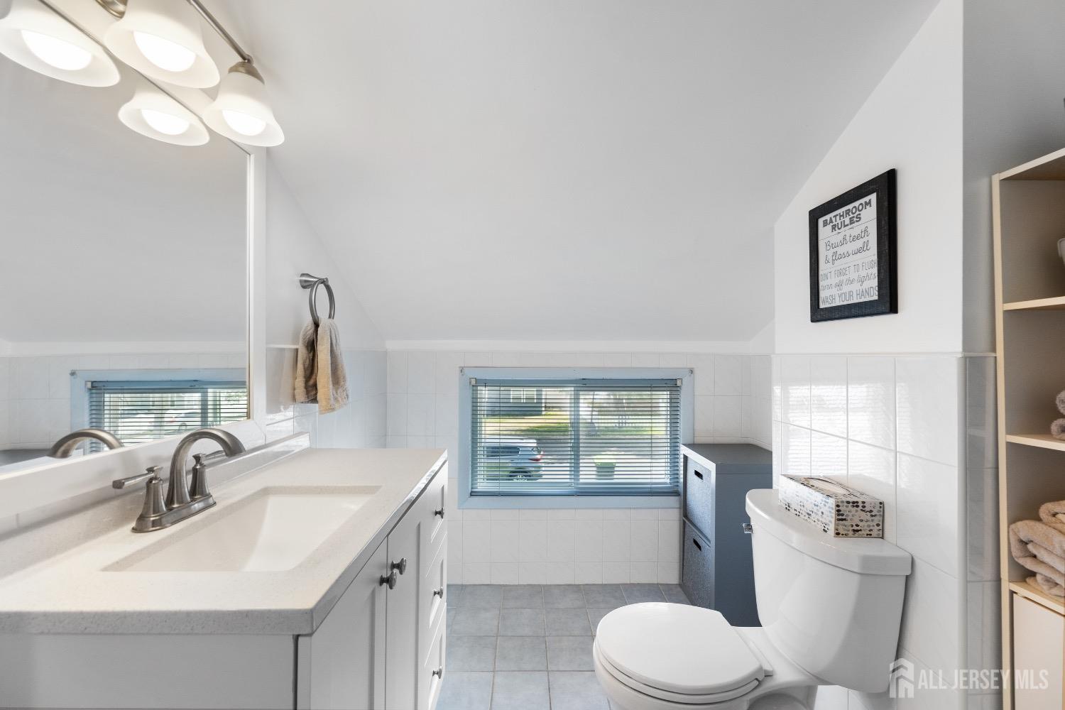 9 Pine Tree Road Old Bridge, NJ 08857 - Photo 30 of 46 a bathroom with a granite countertop toilet sink and mirror