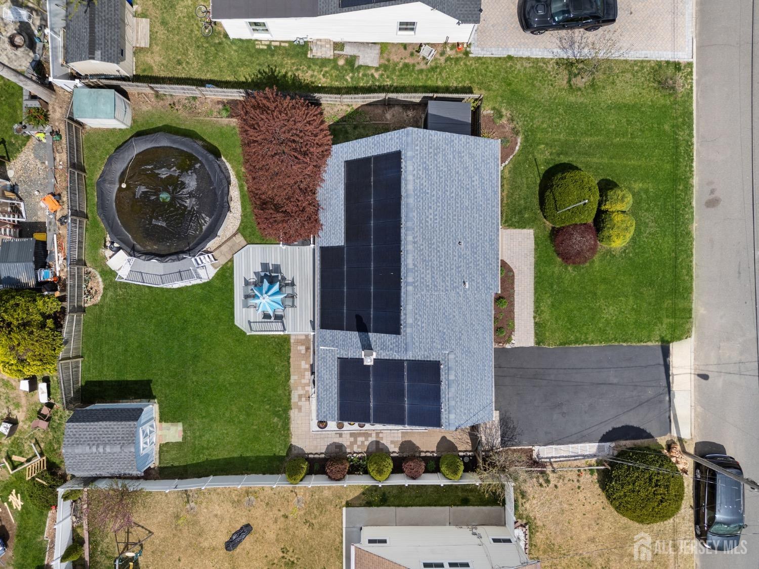 9 Pine Tree Road Old Bridge, NJ 08857 - Photo 35 of 46 an aerial view of a house with a swimming pool