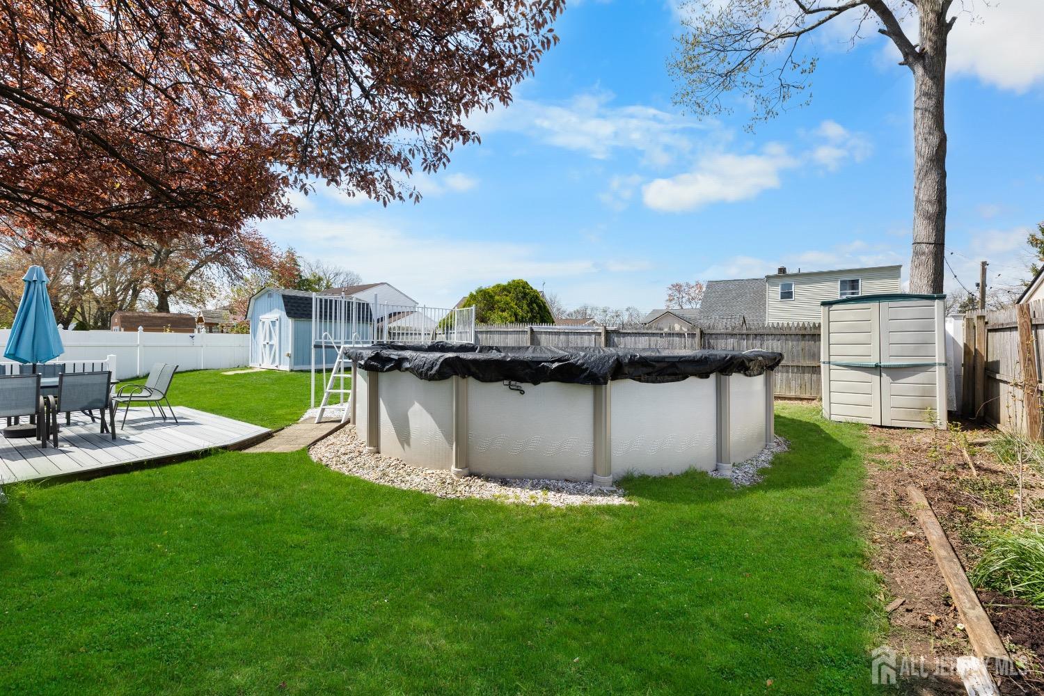 9 Pine Tree Road Old Bridge, NJ 08857 - Photo 4 of 46 a view of a backyard with sitting area