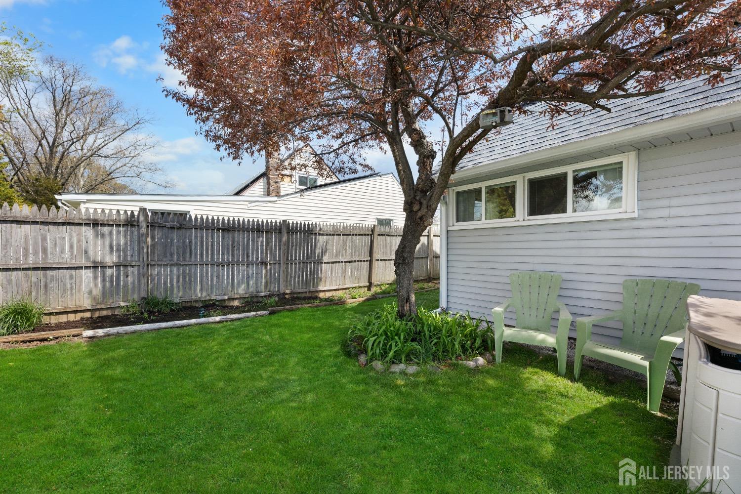 9 Pine Tree Road Old Bridge, NJ 08857 - Photo 5 of 46 a backyard of a house with lots of green space