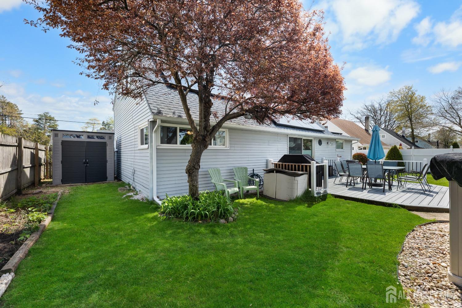 9 Pine Tree Road Old Bridge, NJ 08857 - Photo 6 of 46 a view of a house with backyard and sitting area