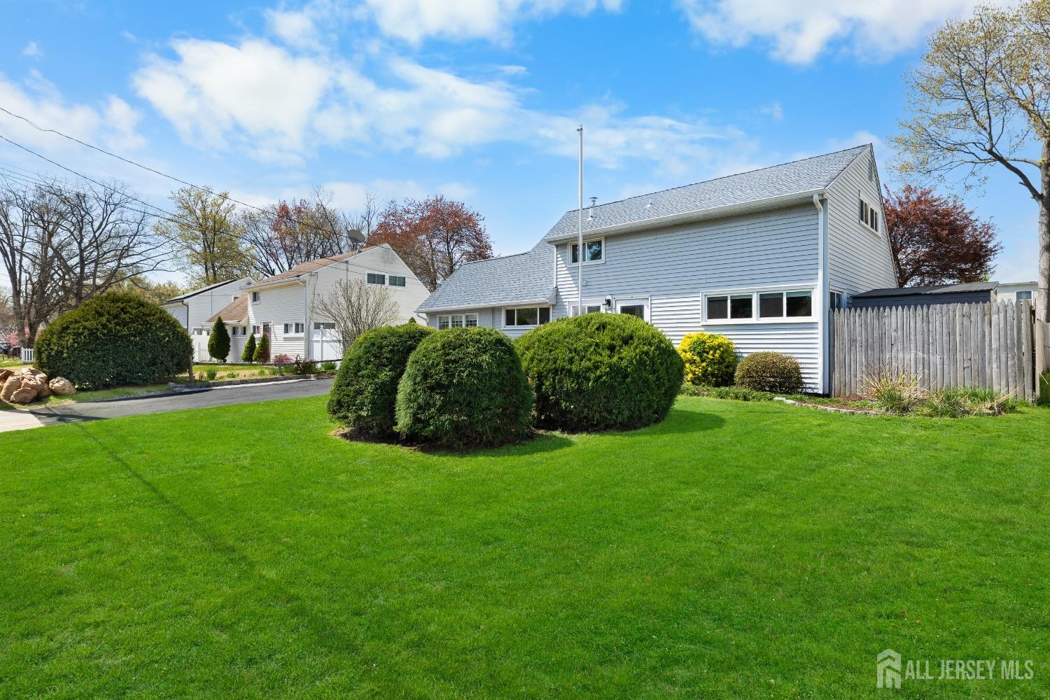 9 Pine Tree Road Old Bridge, NJ 08857 - Photo 10 of 46 a view of a house with a backyard
