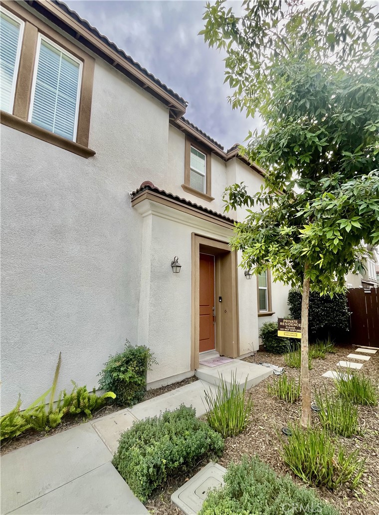 4255 Vermillion Court Riverside, CA 92505 - Photo 3 of 20 a front view of a house with garden
