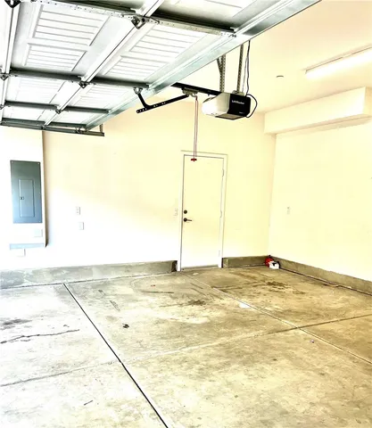 a white toilet sitting next to a bathroom sink and vanity