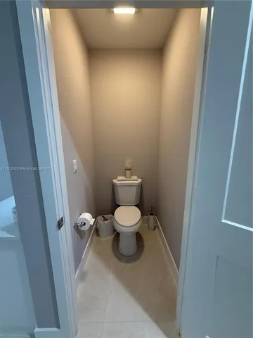 a bathroom with a toilet