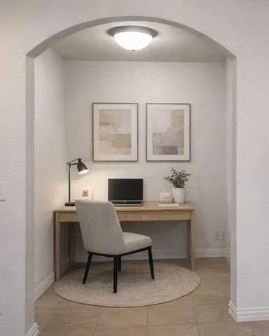 a view of a workspace with furniture