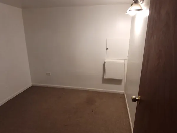 an empty room with an entryway