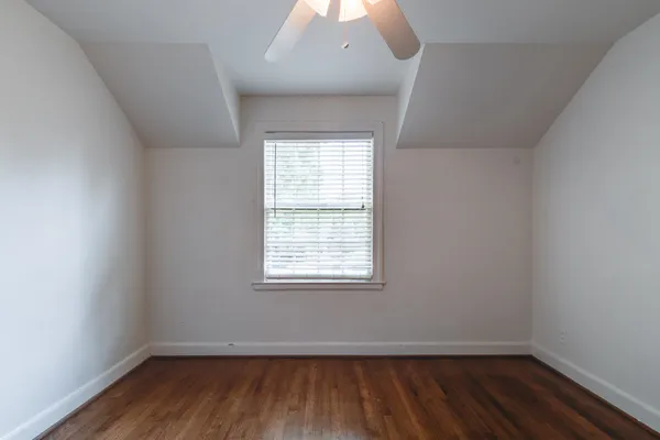 a kitchen with a stove and a refrigerator