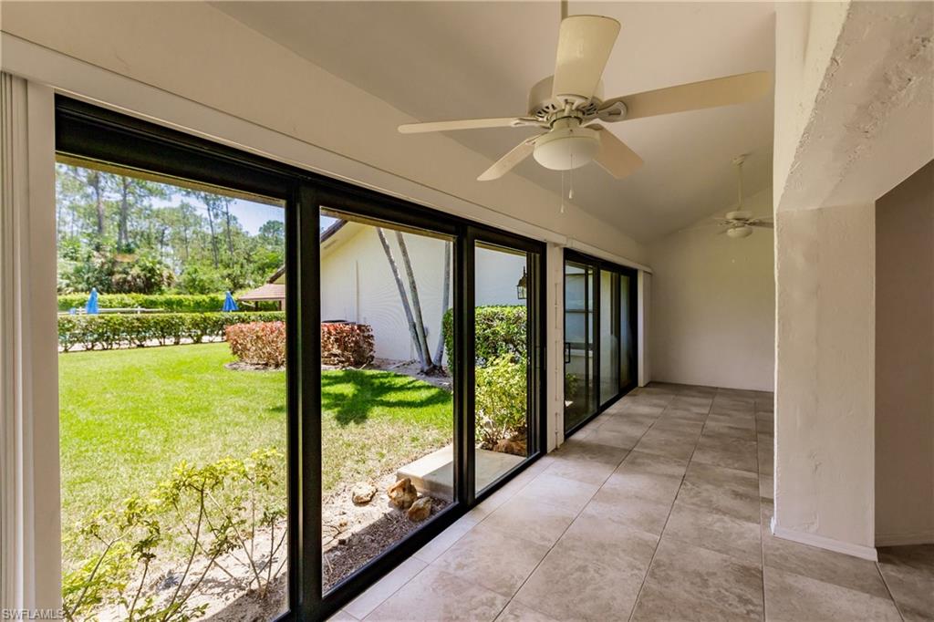 2118 Buckingham Lane Naples, FL 34112 - Photo 17 of 41 wooden floor in an empty room with a large window