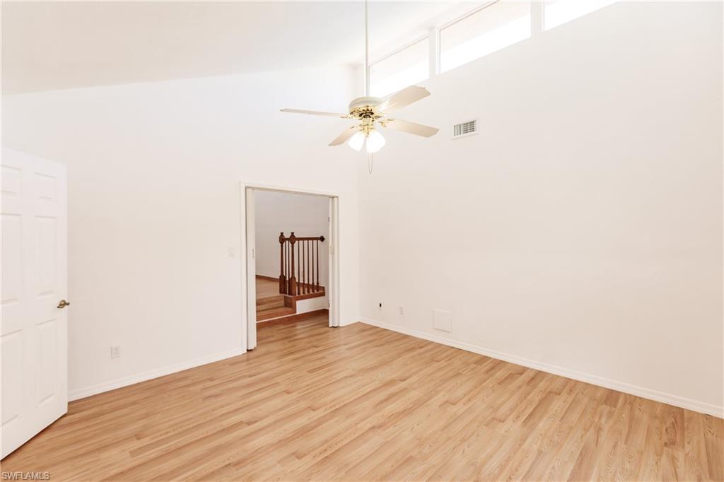 2118 Buckingham Lane Naples, FL 34112 - Photo 31 of 41 a view of a room with a wooden floor