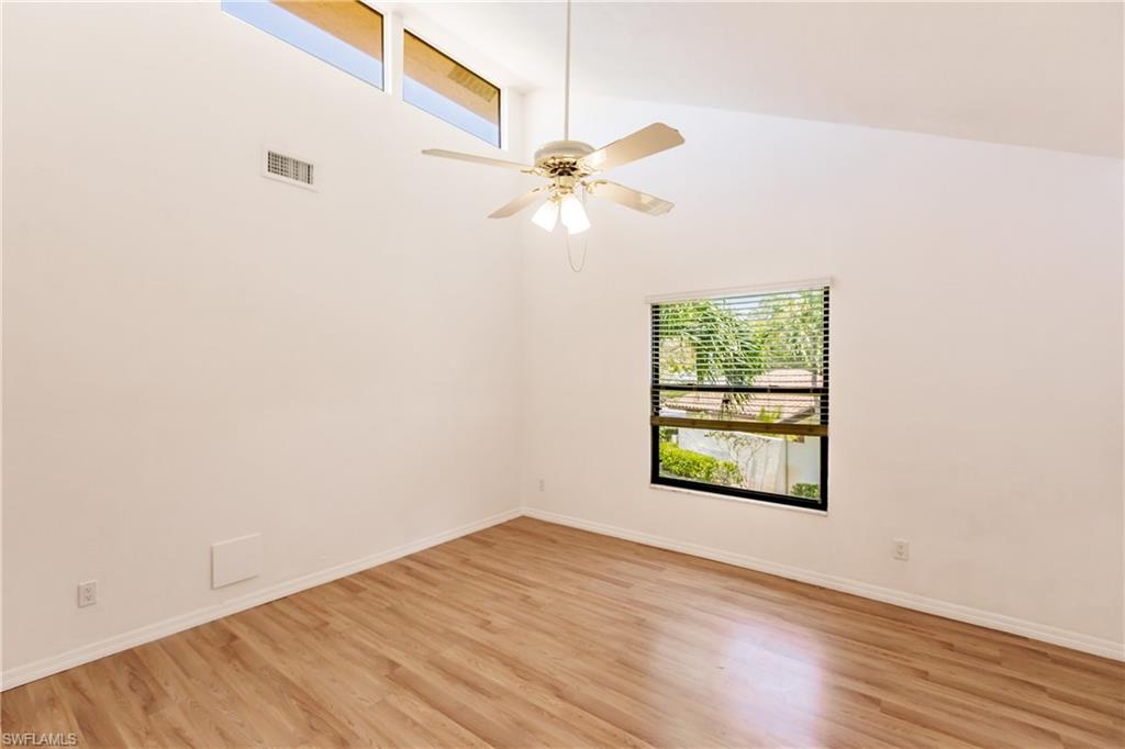 2118 Buckingham Lane Naples, FL 34112 - Photo 36 of 41 an empty room with a window and a fan