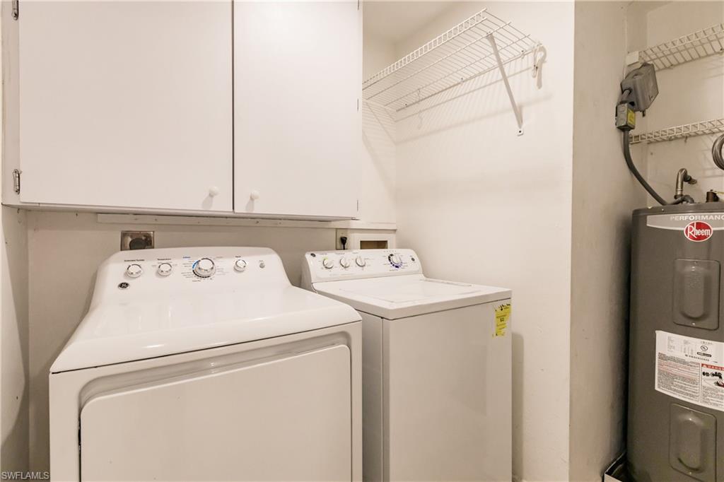 2118 Buckingham Lane Naples, FL 34112 - Photo 38 of 41 a utility room with dryer and washer