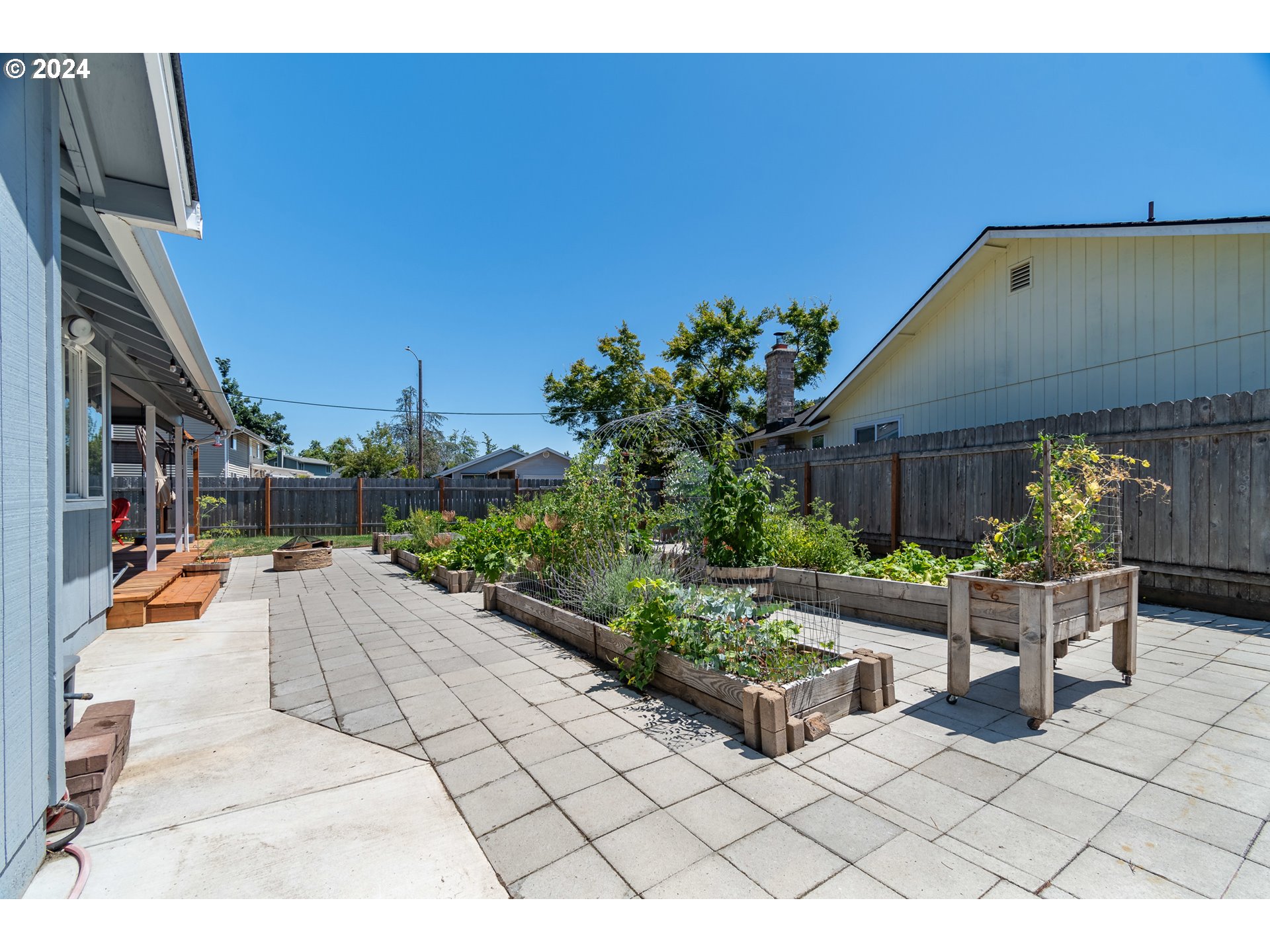 7345 B Street Springfield, OR 97478 - Photo 39 of 48 a view of a patio with couches and potted plants