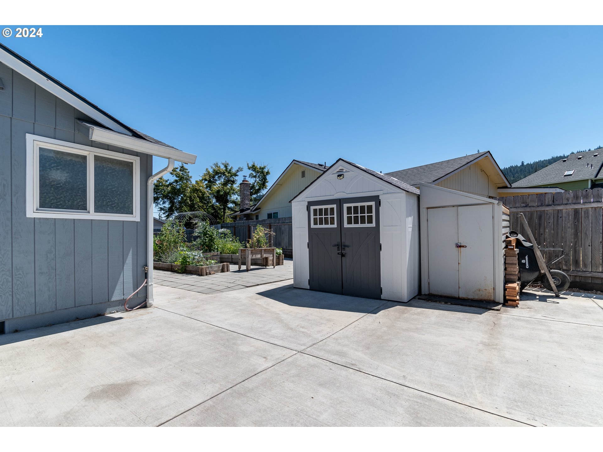 7345 B Street Springfield, OR 97478 - Photo 41 of 48 a view of a house with a yard and garage