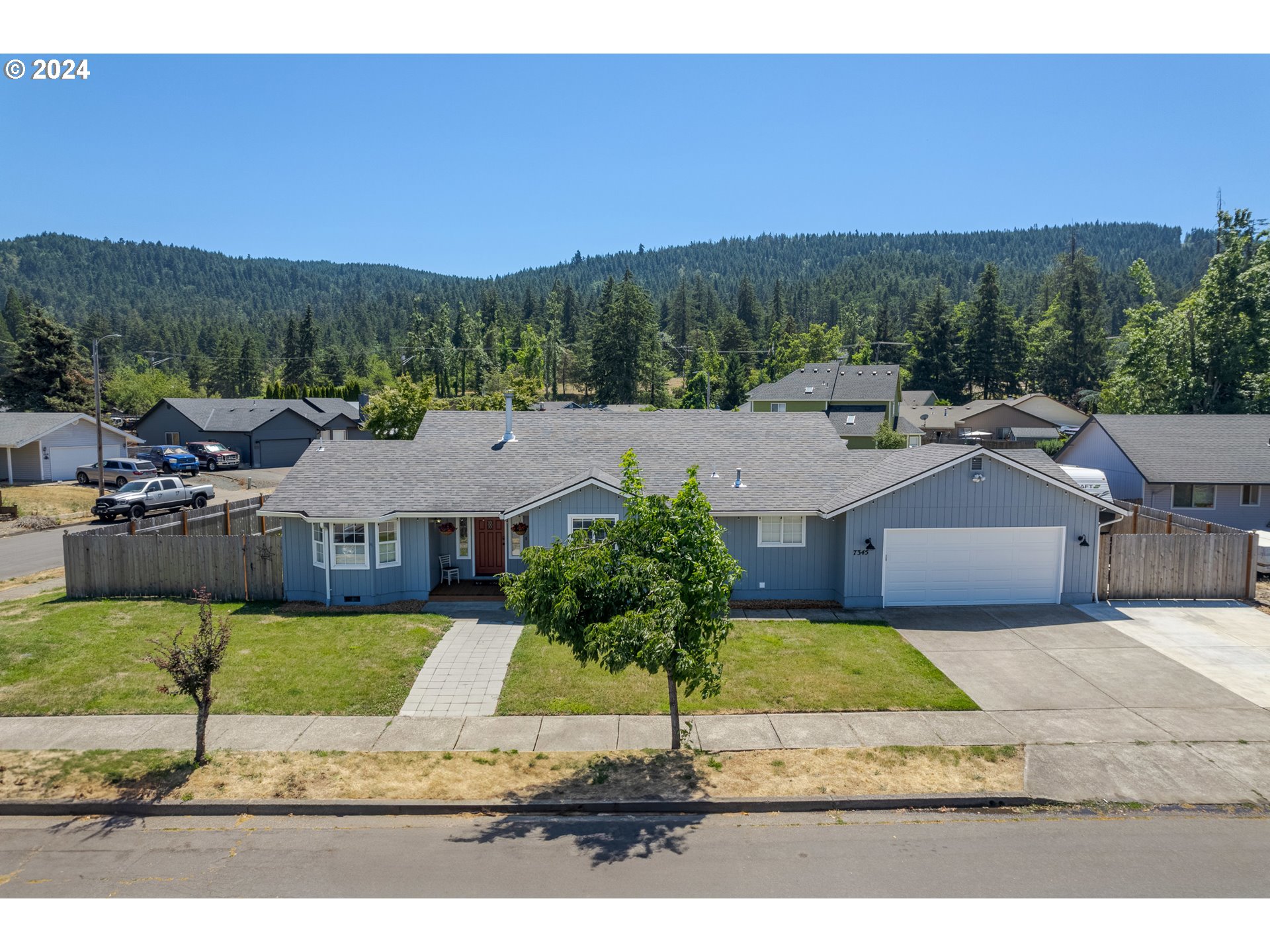 7345 B Street Springfield, OR 97478 - Photo 43 of 48 a view of a house with a yard and sitting area