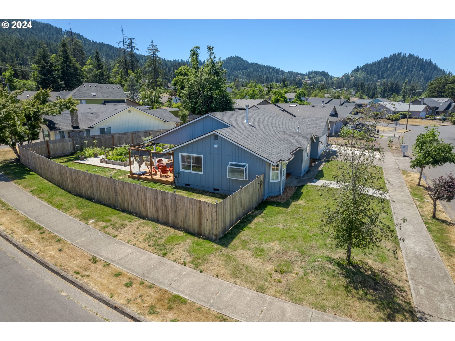 7345 B Street Springfield, OR 97478 - Photo 45 of 48 a aerial view of a house and a yard