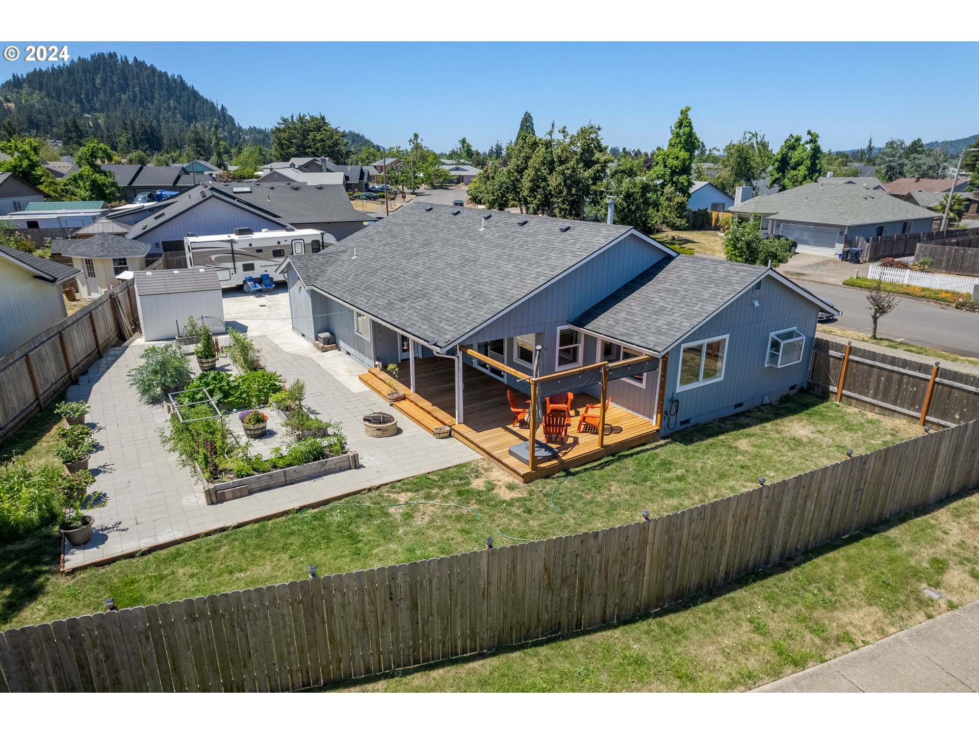 7345 B Street Springfield, OR 97478 - Photo 46 of 48 a aerial view of a house with a garden