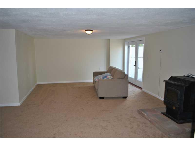 449 Upper Middletown Road Smock, PA 15480 - Photo 22 of 25 Den/Family/Great Room. New wall to wall carpet with walkout to patio