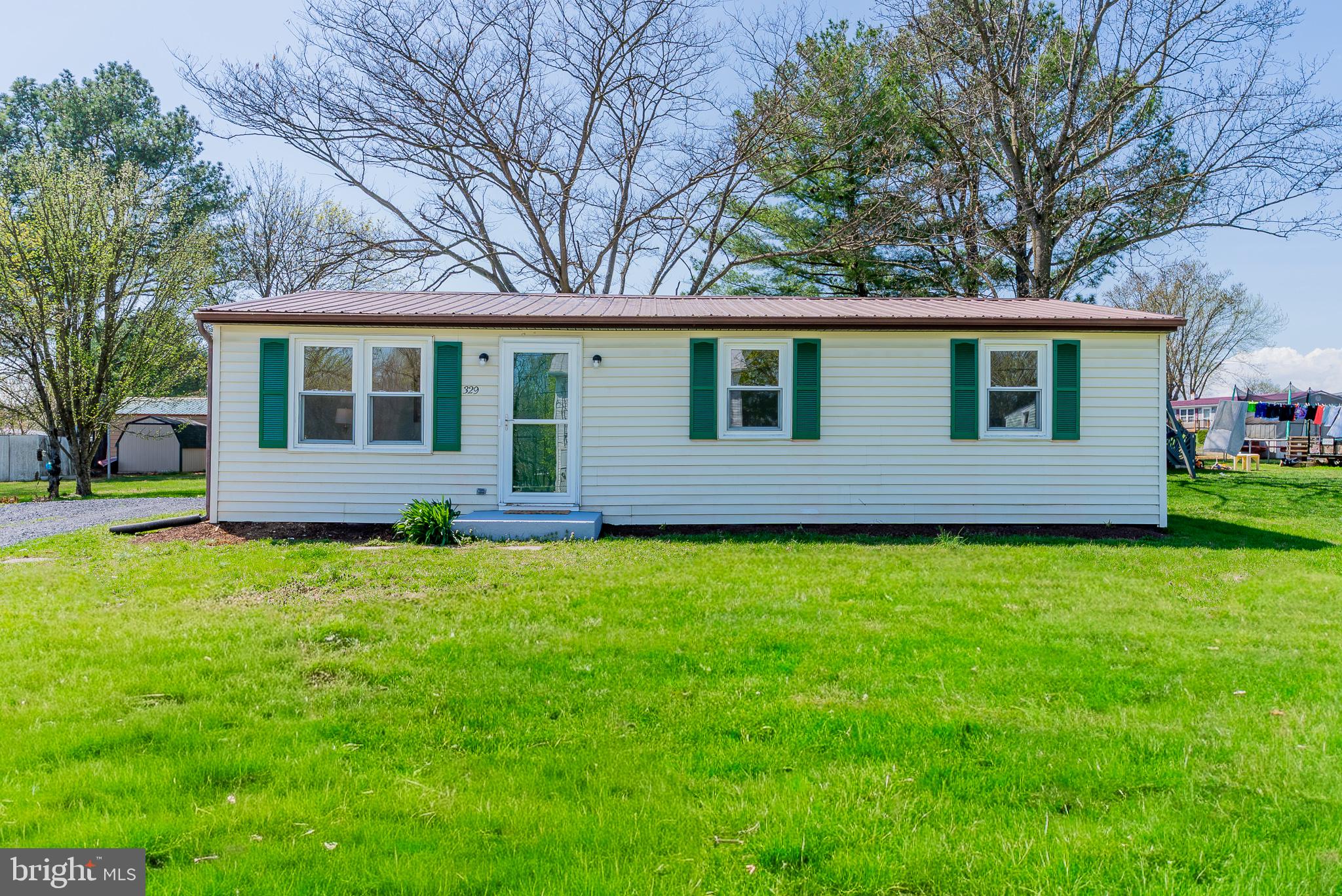 329 Dutch Mount Mount Jackson, VA 22842 - Photo 47 of 50 Charming home with lush green lawn.
