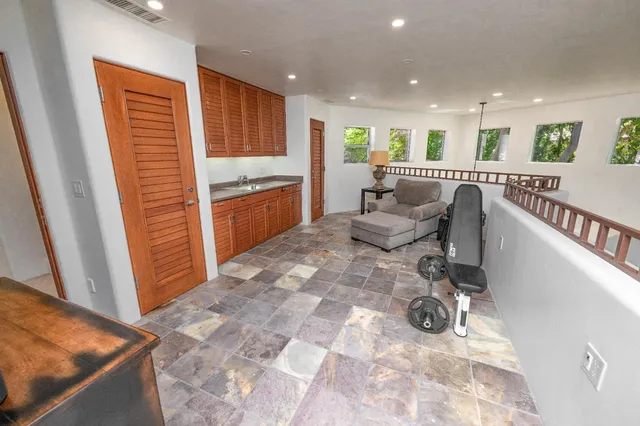 a front view of house with yard and seating area