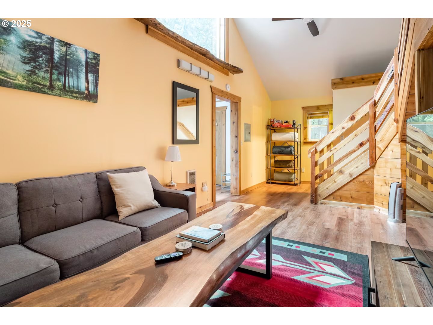 71010 Mc Farland Road Rhododendron, OR 97049 - Photo 13 of 34 a living room with furniture and a wooden floor