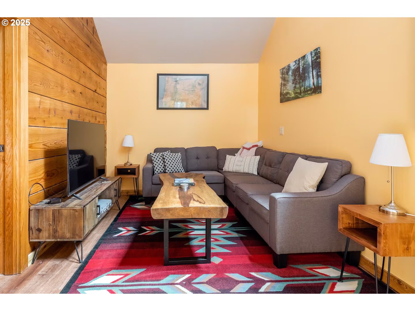 71010 Mc Farland Road Rhododendron, OR 97049 - Photo 14 of 34 a living room with furniture a flat screen tv and a table
