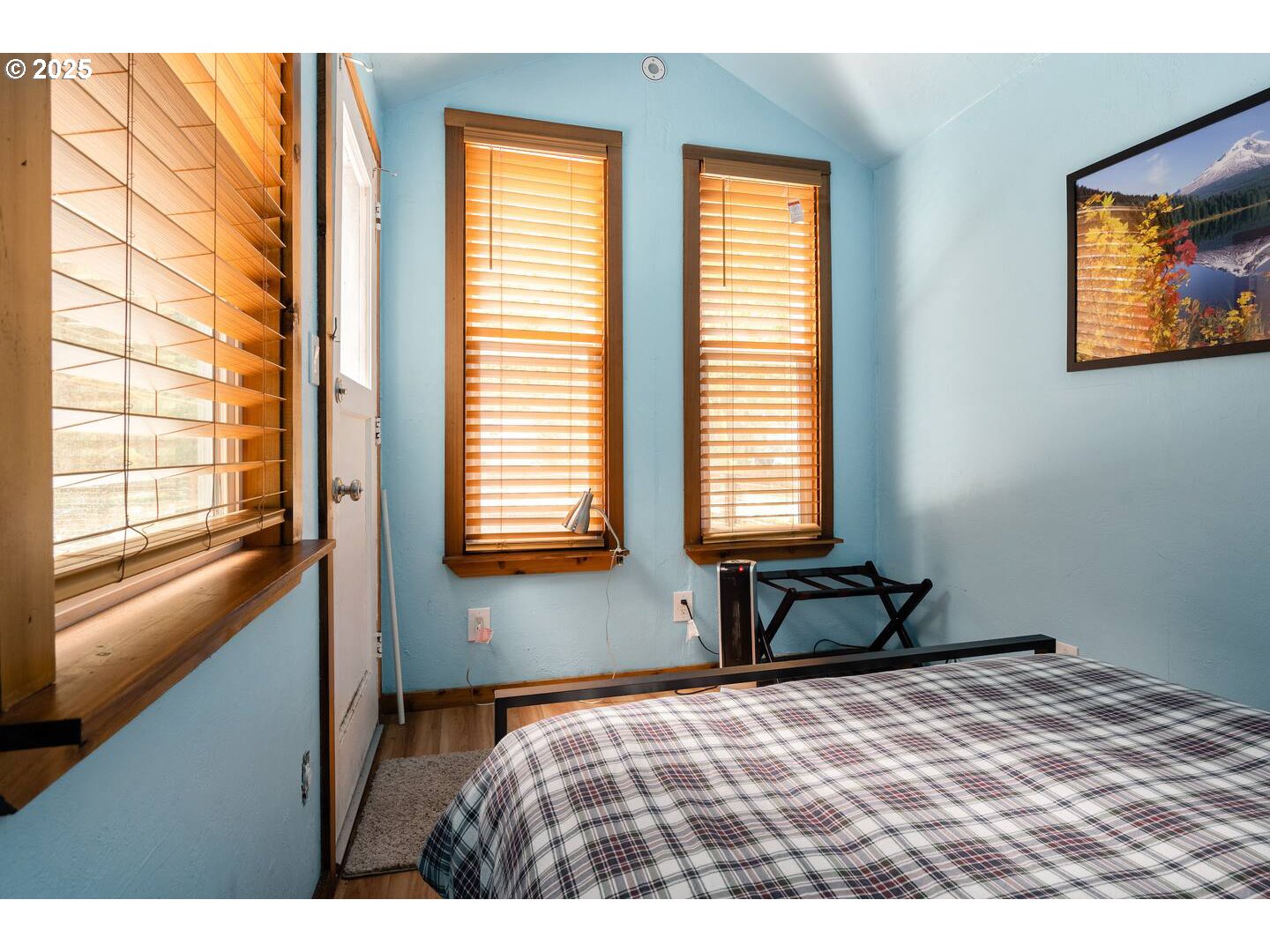 71010 Mc Farland Road Rhododendron, OR 97049 - Photo 27 of 34 a bedroom with a bed and a window