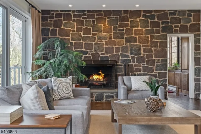 a kitchen with stainless steel appliances granite countertop a sink and a stove