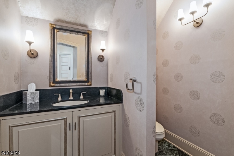 101 Sunny Branch Road Far Hills, NJ 07931 - Photo 15 of 35 a bathroom with a granite countertop sink toilet and mirror