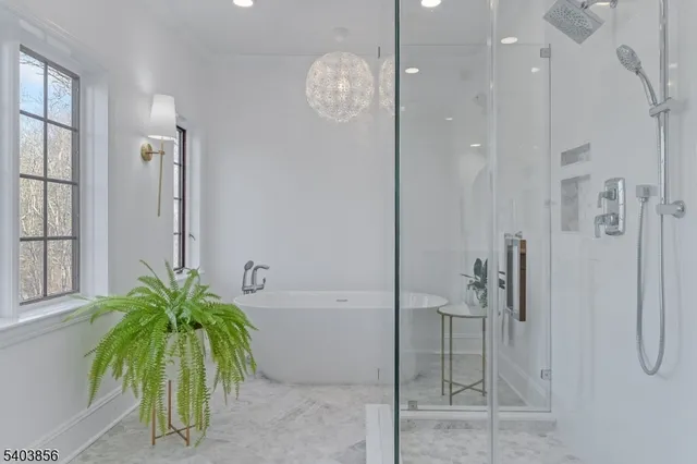 a bathroom with a sink a vanity and a mirror