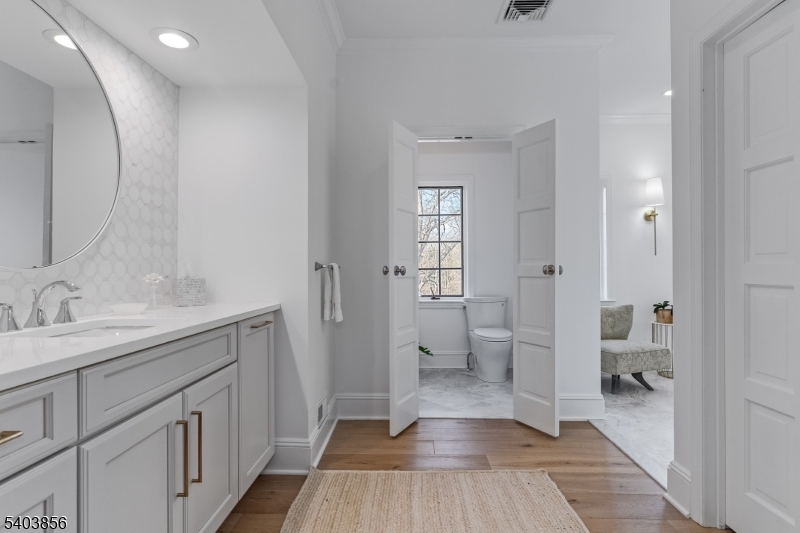 101 Sunny Branch Road Far Hills, NJ 07931 - Photo 20 of 35 a bathroom with a sink and a mirror