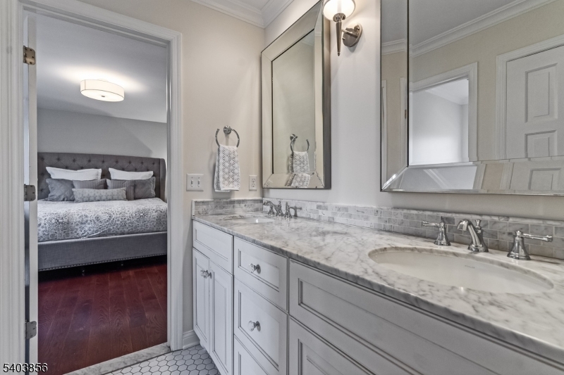 101 Sunny Branch Road Far Hills, NJ 07931 - Photo 24 of 35 a bathroom with double sink and a mirror