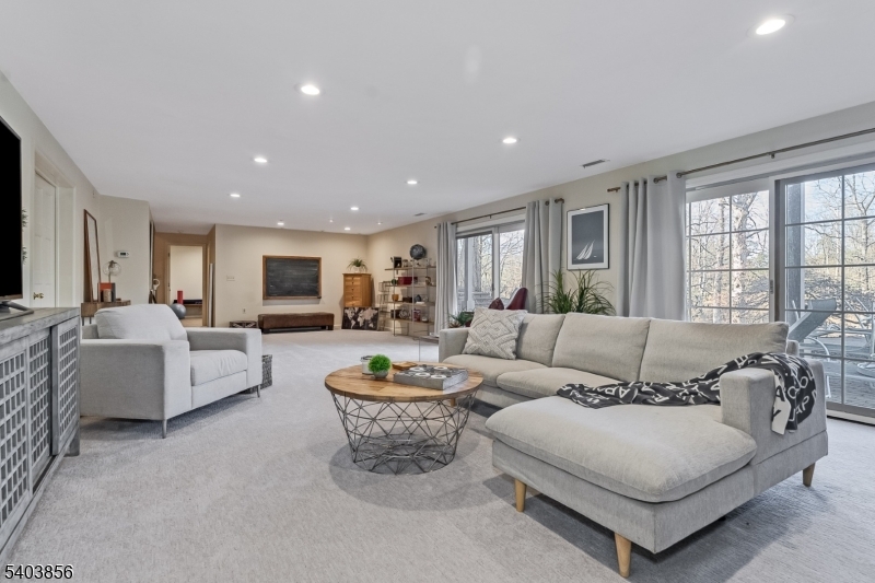 101 Sunny Branch Road Far Hills, NJ 07931 - Photo 26 of 35 a living room with furniture and a large window