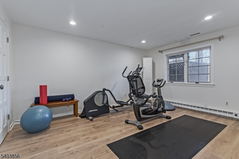 101 Sunny Branch Road Far Hills, NJ 07931 - Photo 27 of 35 a view of a room with gym equipment